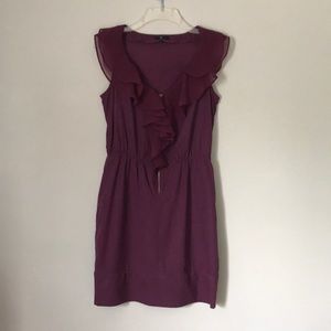 Purple sleeveless dress.